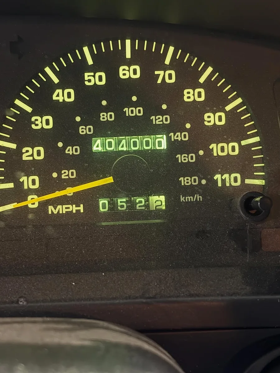 A Toyota odometer reading 404,000 miles
